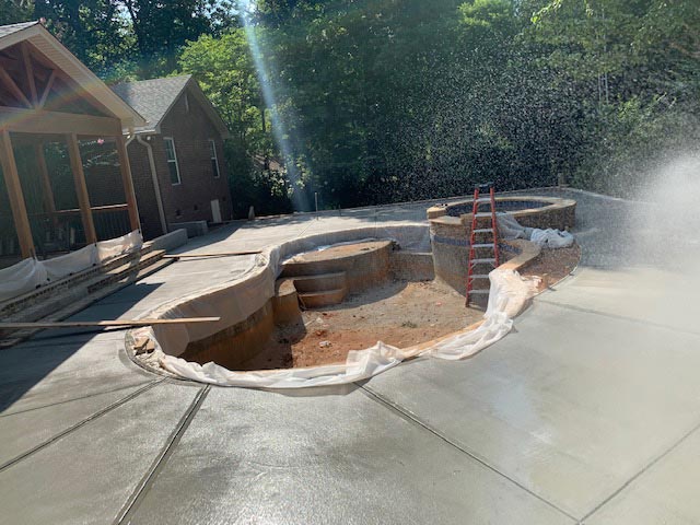Southeastern Tree and Landscaping | concrete poured for pool decking