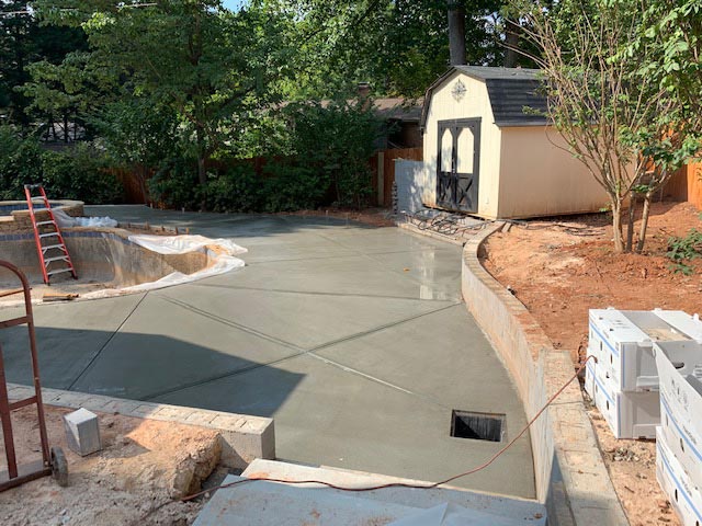 Southeastern Tree and Landscaping | concrete poured in residential backyard