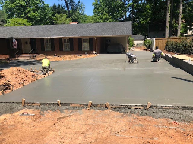 Southeastern Tree and Landscaping | finishing concrete driveway